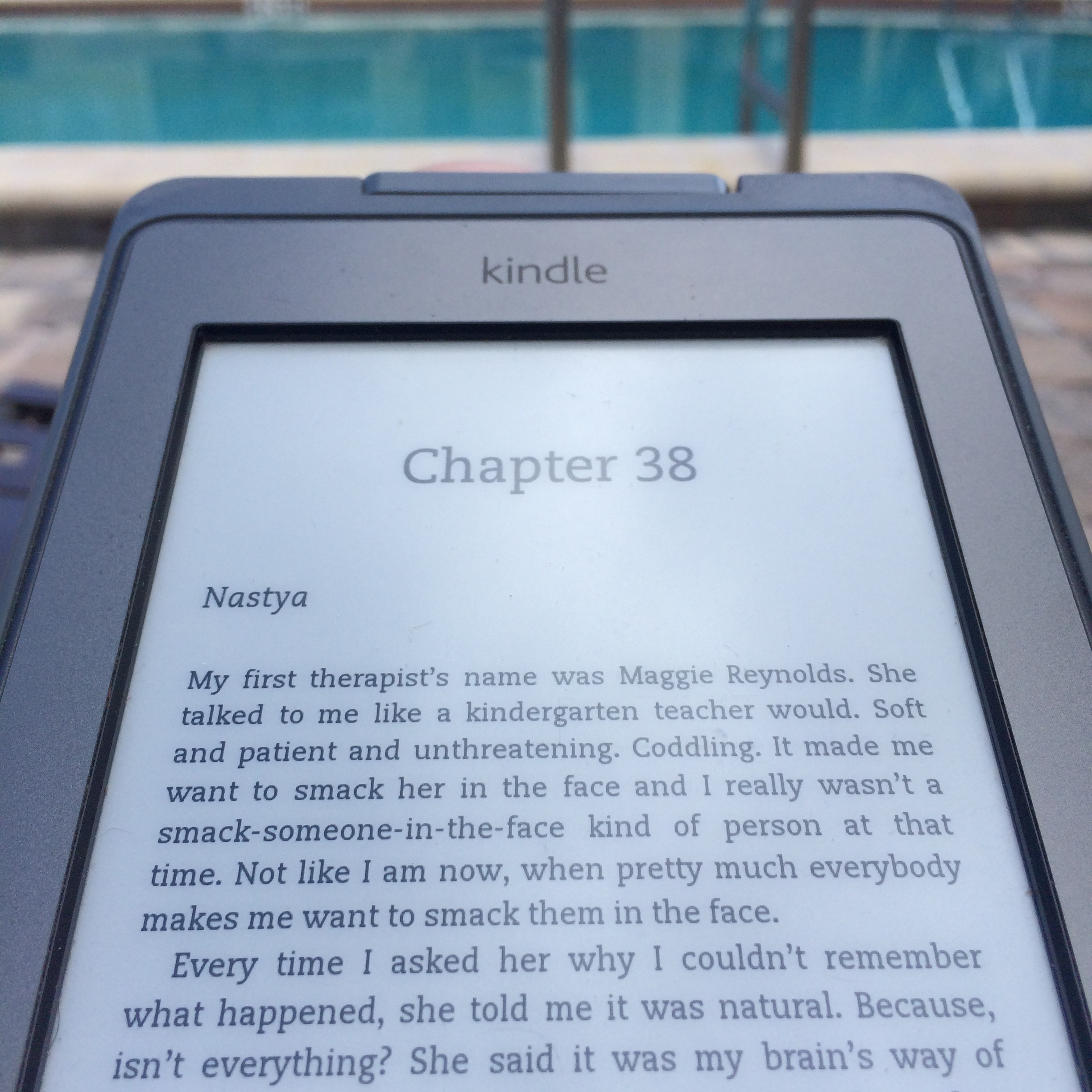 kindle reading by pool